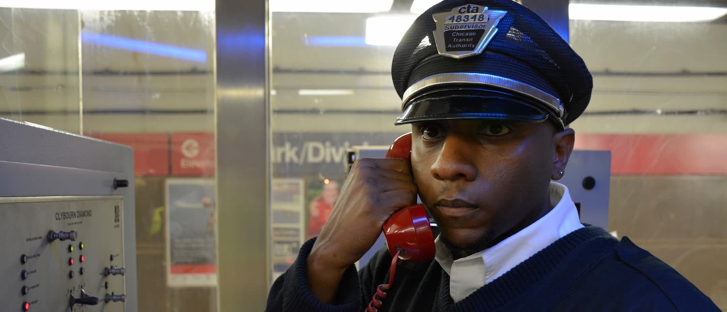 CTA employee on a phone