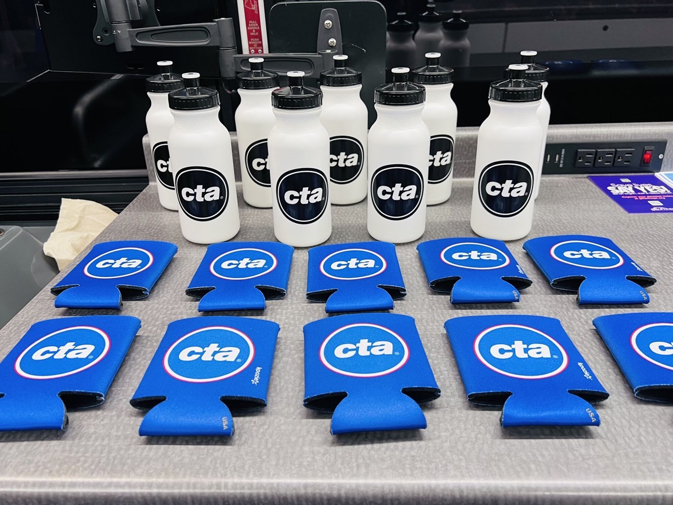 Water bottles and koozies available inside the Community Connection bus.